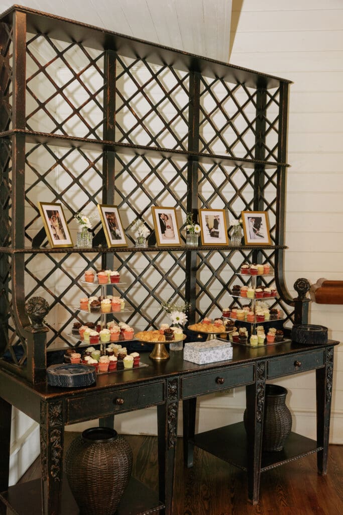 Wedding reception display featuring framed family wedding photographs that celebrate generations of love.